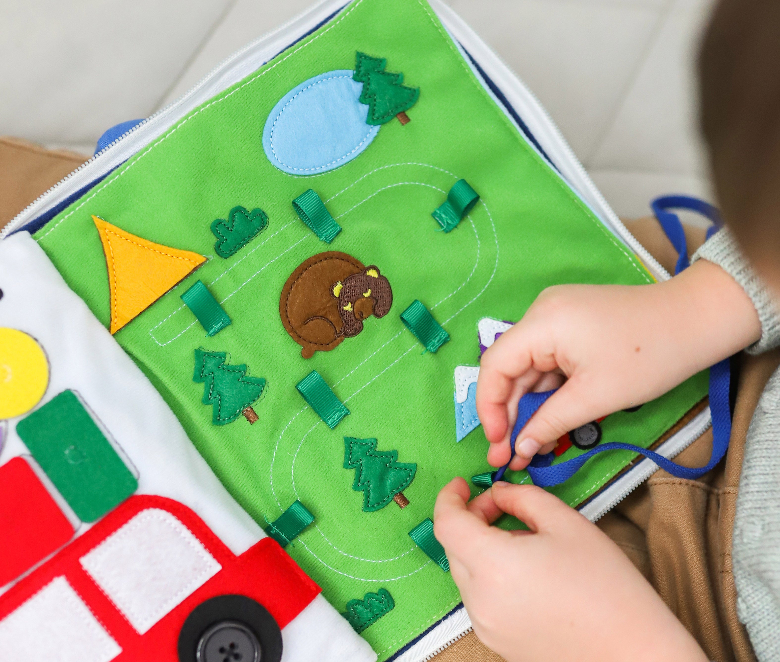 Curious Columbus Fabric Activity Book – Away We Go – Interactive Soft Travel Book